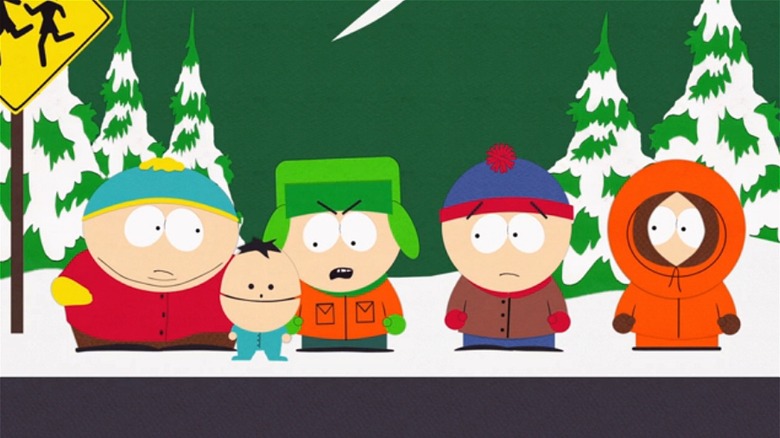 Cartman, Kyle, Stan, and Kenny standing in a line 