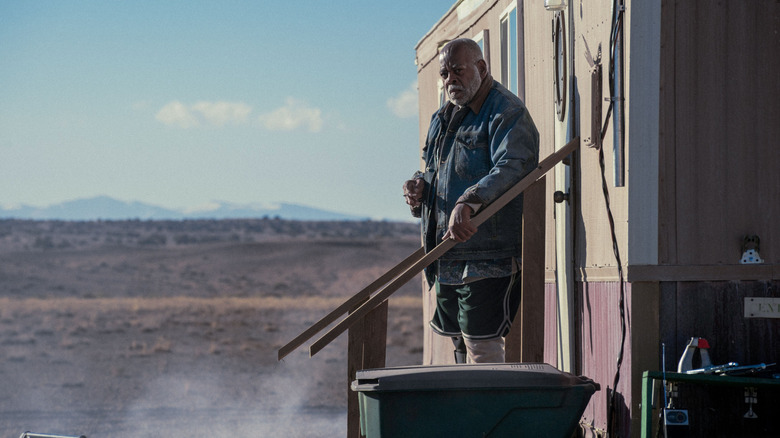 Josiah standing outside of his trailer