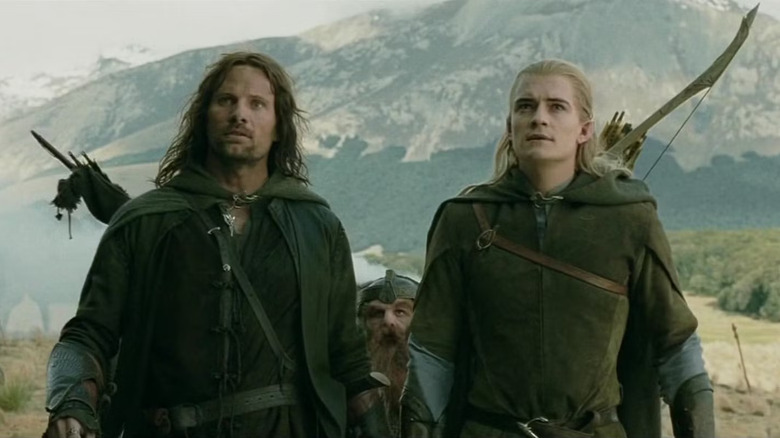 Aragorn and Legolas look up in "The Lord of the Rings: The Two Towers" (2002)