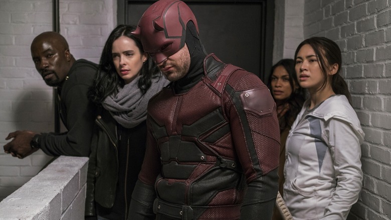 The Defenders standing together