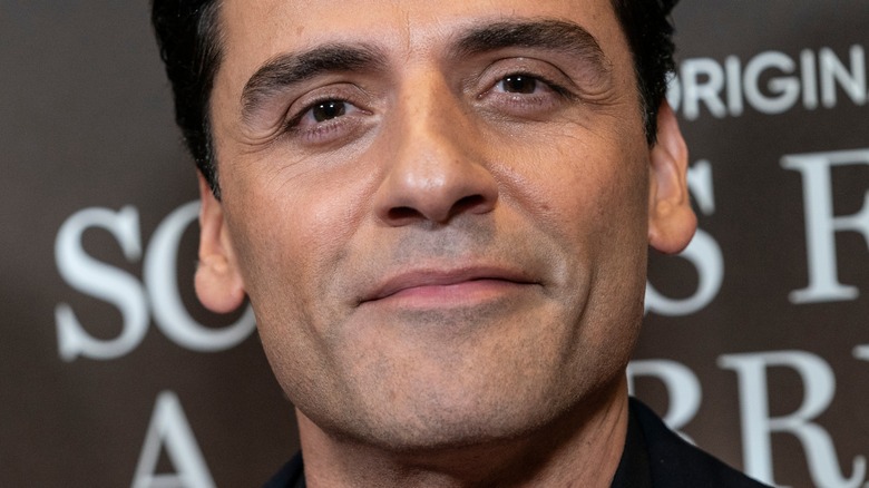 Oscar Isaac smiles