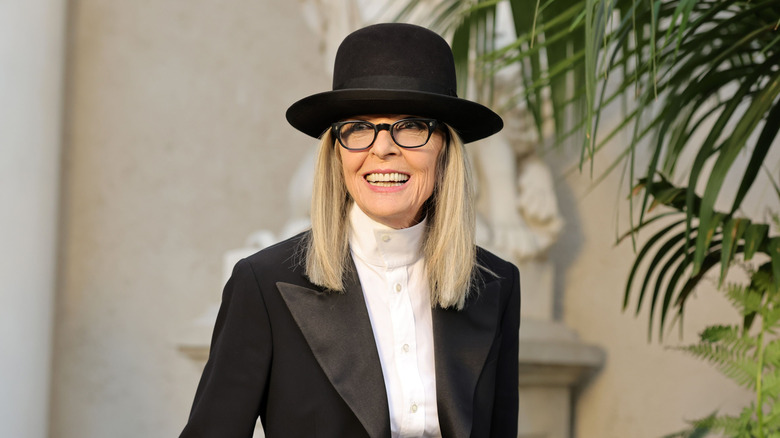 Diane Keaton smiling in a hat