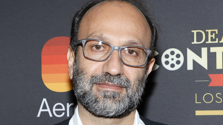 Asghar Farhadi grey beard glasses