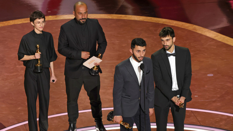 Yuval Abraham and Basel Adra accepting the Oscar for No Other Land