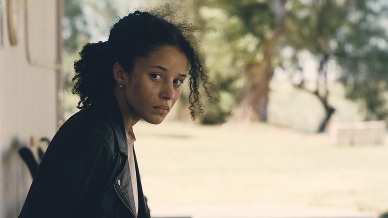 Willa looking over her shoulder scared in One Battle After Another