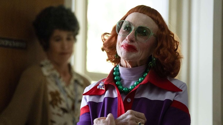 Gladys smiling in Weapons