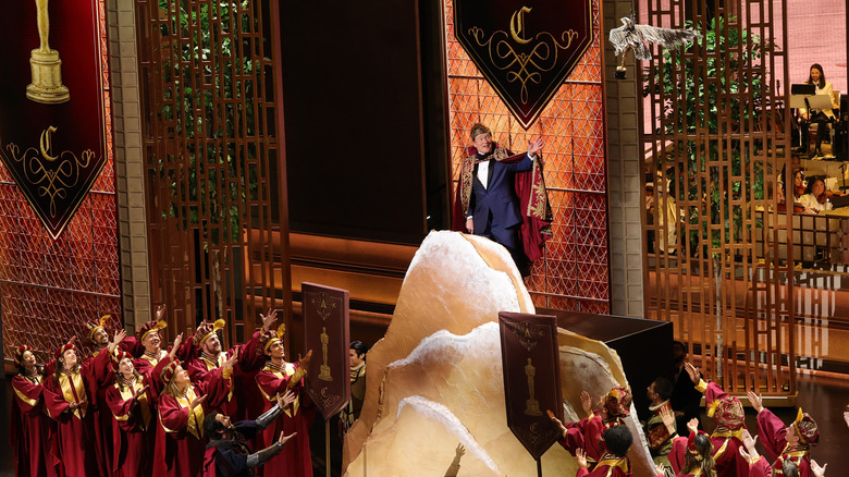 Conan O'Brien holding the Academy Awards