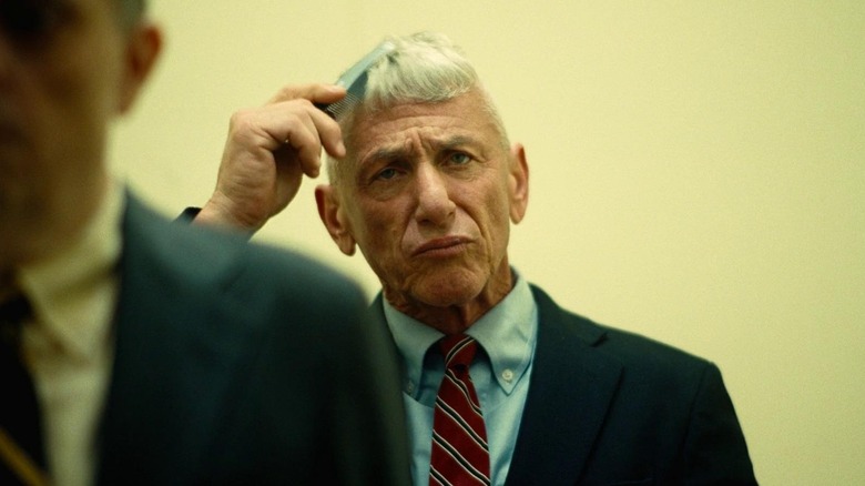 Col. Steven J. Lockjaw combing his hair