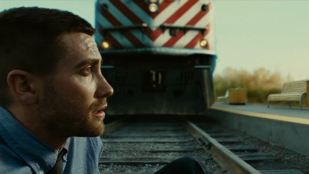 Jake Gyllenhaal on train tracks