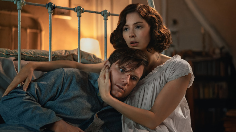 Julia cradling Henry in Outlander: Blood of My Blood