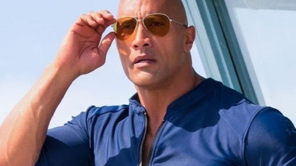 Dwayne Johnson as Mitch Buchannon in Baywatch