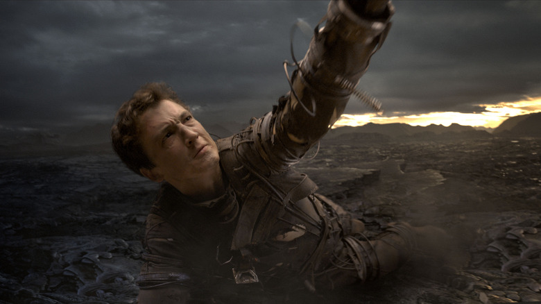 Reed Richards stretching his arm out (2015)