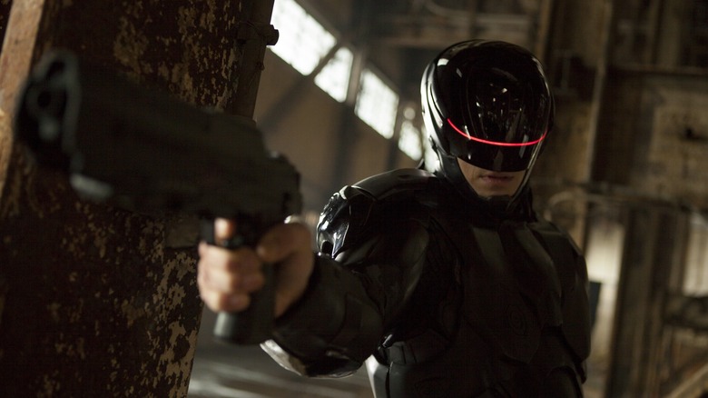 RoboCop points his gun in a training simulation