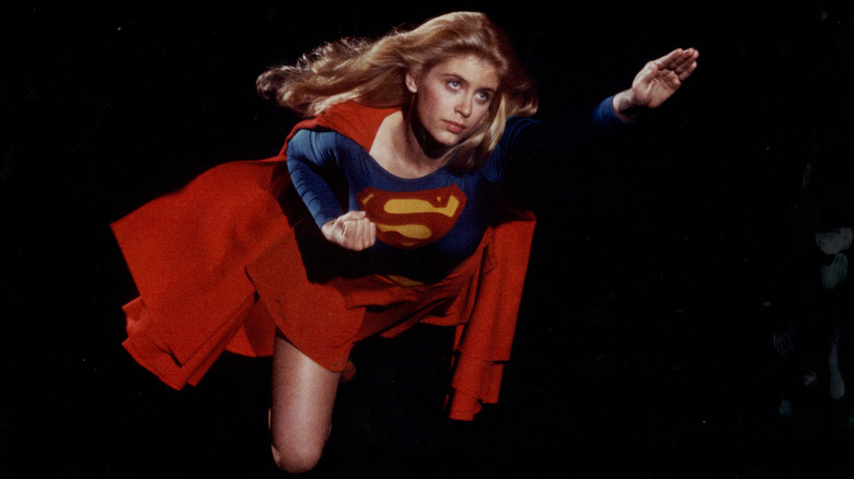 Supergirl flying across a black sky in Supergirl (1984)