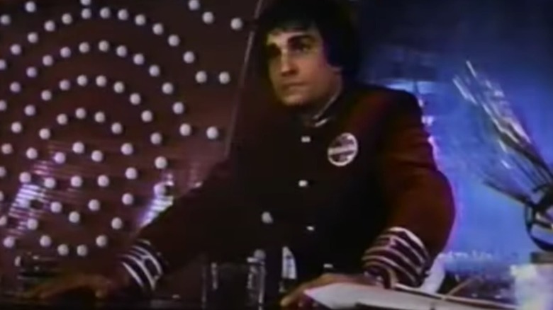 Lou Atkins behind bar