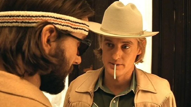 Eli Cash smoking cigarette