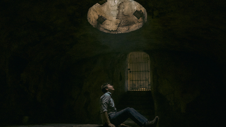 Marty in a prison cell