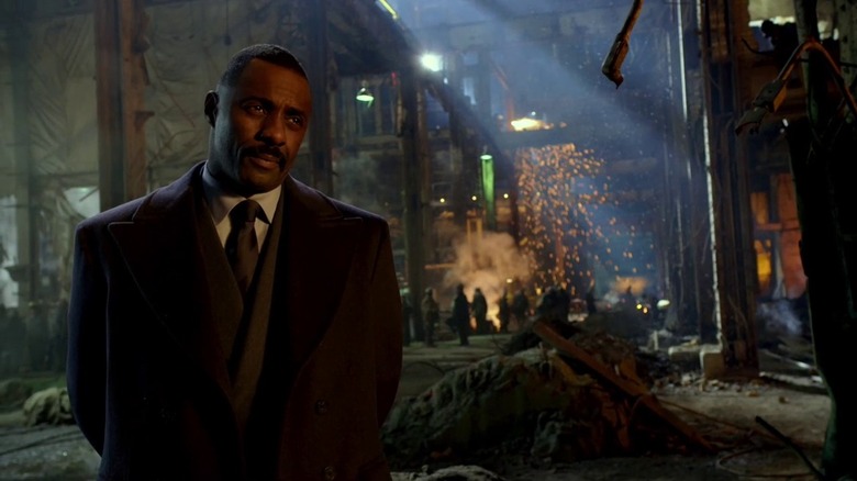 Idris Elba listening passionately