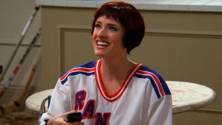 Paget Brewster as Kathy smiling in Friends