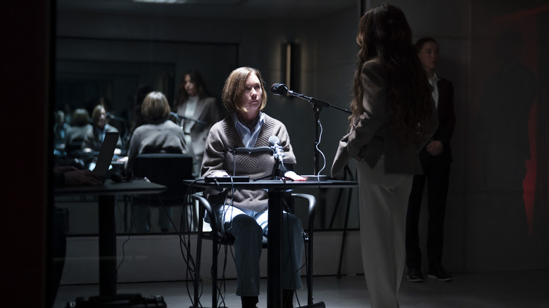 Sinatra being interviewed by Gabriela while Jane stands by in Paradise Season 2