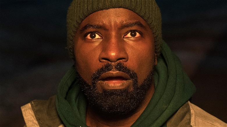 Mike Colter wearing a beanie in Evil