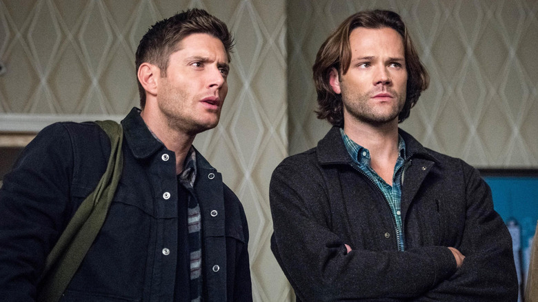 Dean and Sam looking skeptical on Supernatural (2005 - 2020)