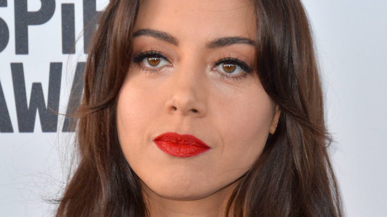 Aubrey Plaza wearing red lipstick 