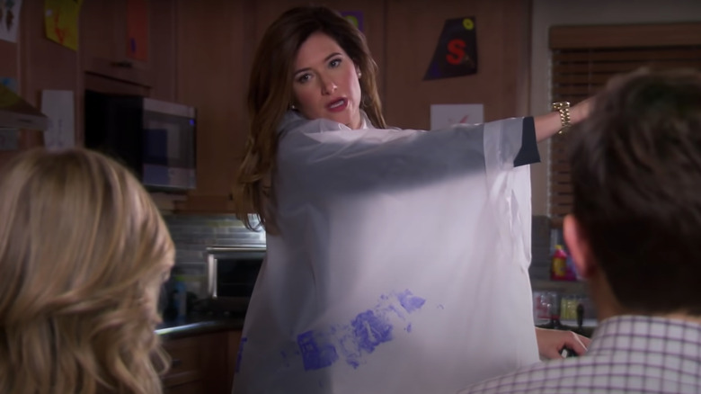 Kathryn Hahn wearing a poncho