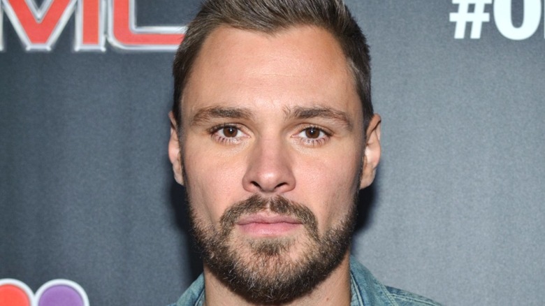 Patrick Flueger with a neutral expression