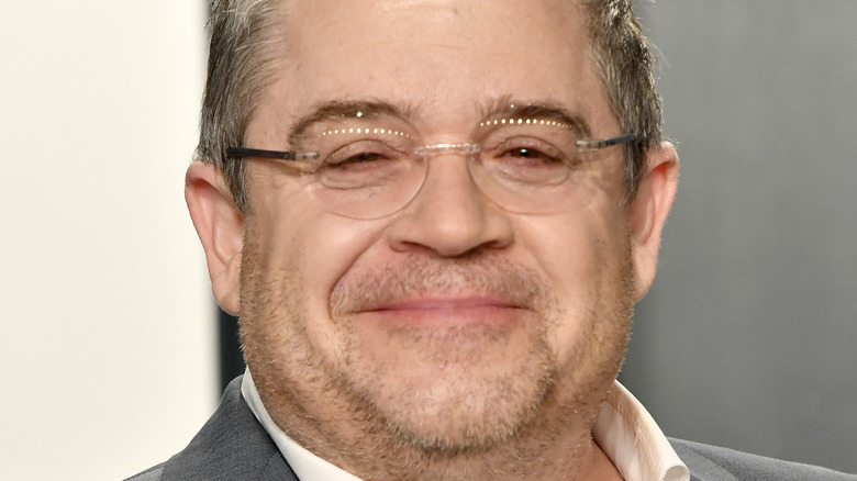 Patton Oswalt wearing glasses