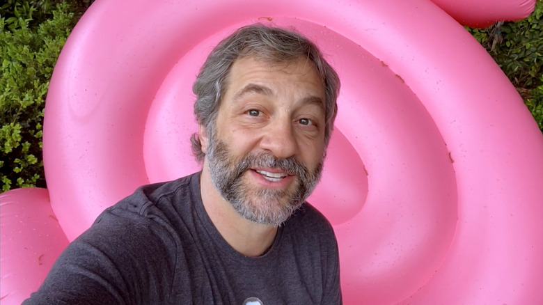 Judd Apatow with pink background
