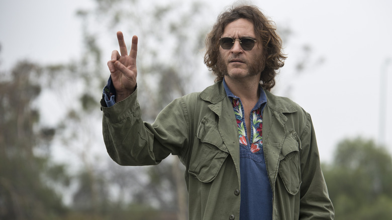 Larry "Doc" Sportello throwing up a peace sign in "Inherent Vice" (2014)