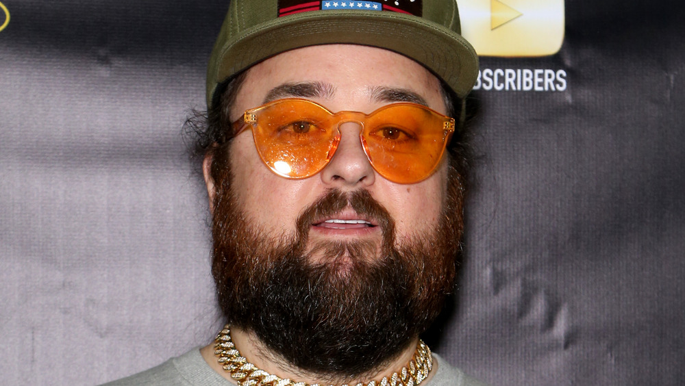 Austin Chumlee Russell hat orange glasses