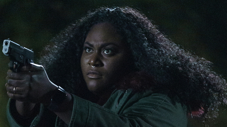 Leota Adebayo Danielle Brooks points a gun in Peacemaker