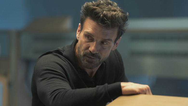 Rick Flag Sr. leaning against a desk on Peacemaker Season 2