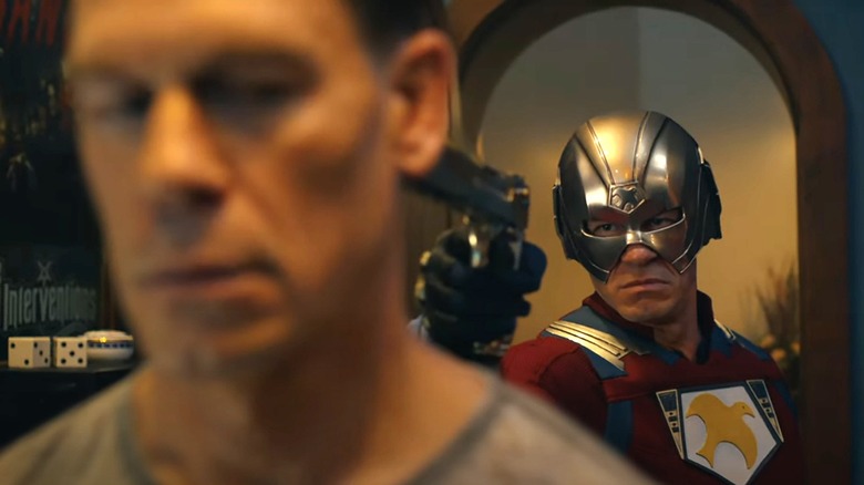 Chris points a gun at a version of himself in Peacemaker Season 2