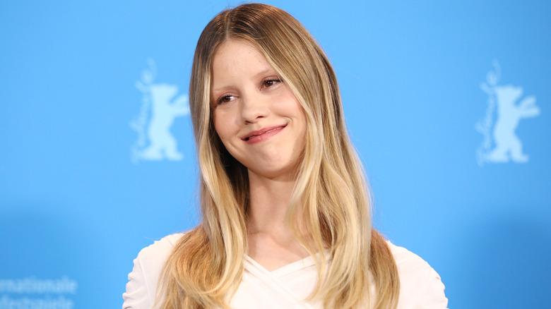 Mia Goth attends an event