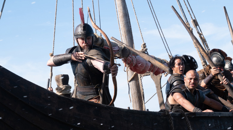 Odysseus shooting from the ship in "The Odyssey" (2026)