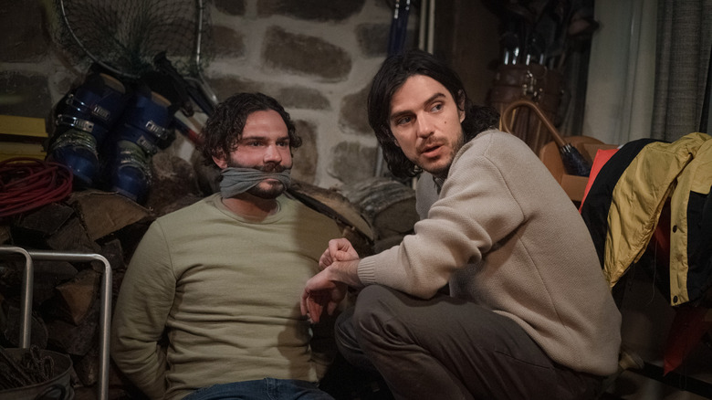 Felix and a tied-up Josh