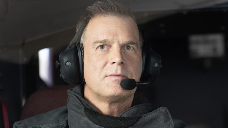 Bobby wearing a headset in "9-1-1"