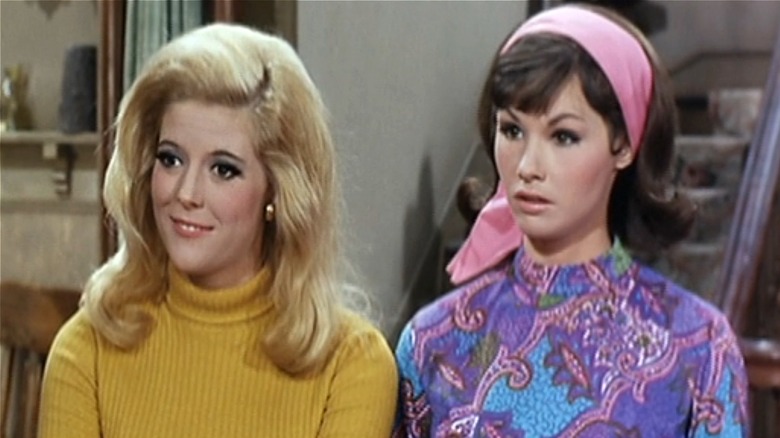 Billie Jo smiling next to a surprised Bobbie Jo