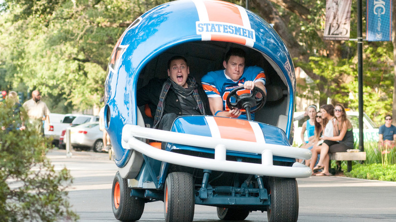 Schmidt and Jenko in a football helmet-shaped vehicle in a chase scene in 22 Jump Street