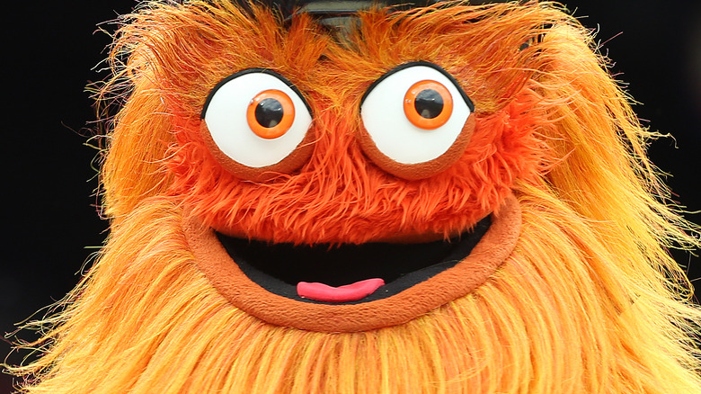 Gritty orange hair smiling