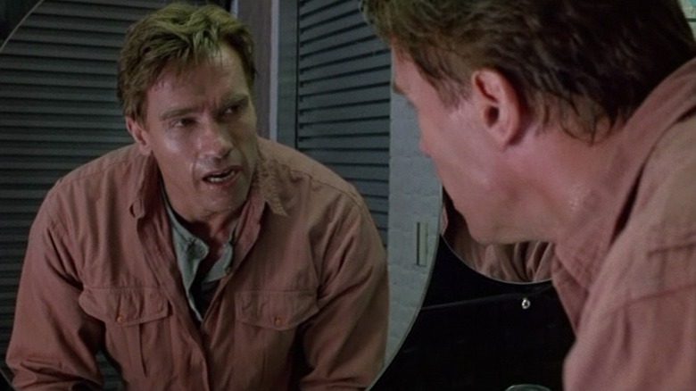 Douglas Quaid talking to himself in a mirror in Total Recall