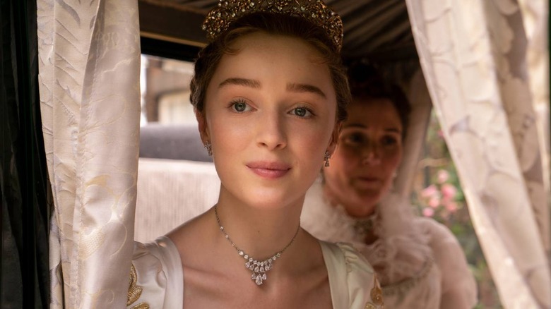 Daphne Bridgerton looking out of a carriage in Bridgerton