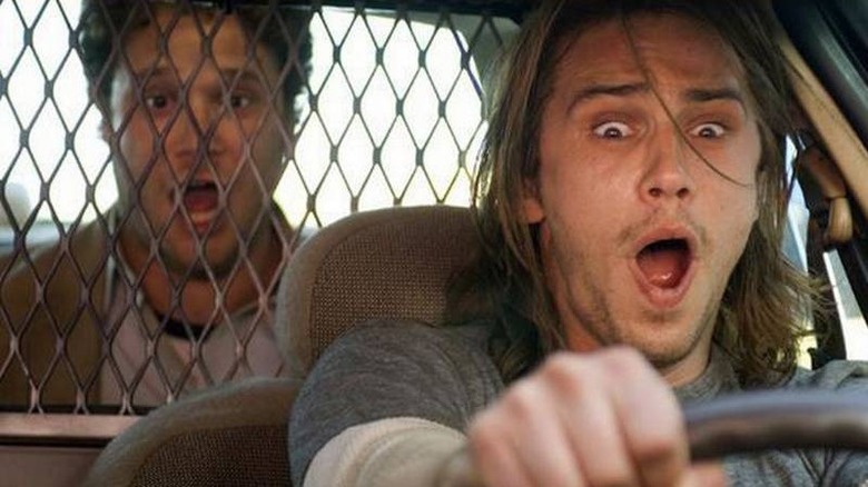 Saul Silver steals a police car with Dale Denton in the back
