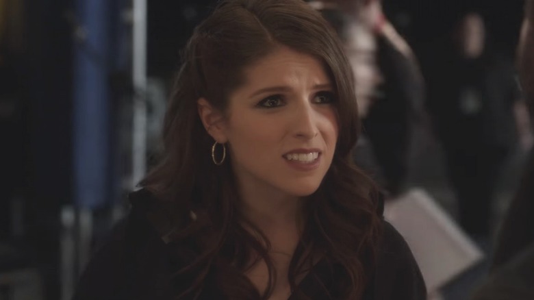 Beca looking concerned