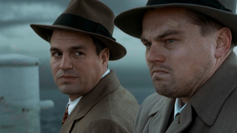 Teddy and Chuck overlook the ocean in Shutter Island (2010)