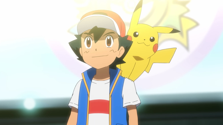 Ash and Pikachu standing in an arena