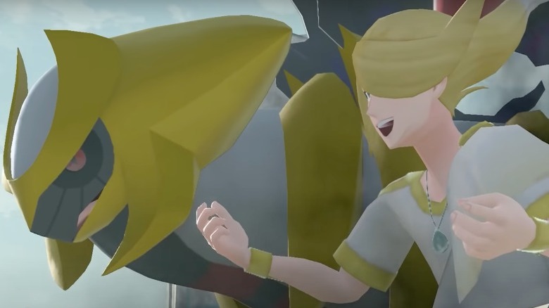 grey and gold Giratina beside gold hair Volo manically smiling